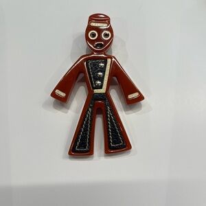Prada Bakelite and leather bellhop brooch